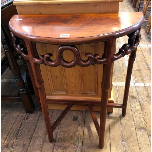 320 - Oriental hardwood demi-lune side table with scrolling gallery and geometric stretchers