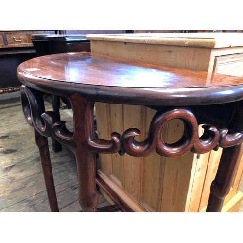 320 - Oriental hardwood demi-lune side table with scrolling gallery and geometric stretchers