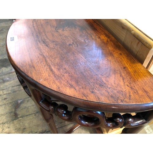 320 - Oriental hardwood demi-lune side table with scrolling gallery and geometric stretchers