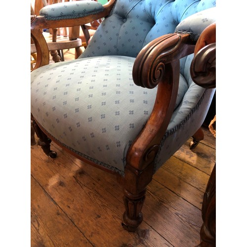 332 - Victorian walnut framed upholstered elbow chair with carved and scrolling detail