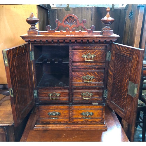 344 - Edwardian oak smokers cabinet with fitted interior and ivorine badge for Army & Navy Stores, and con... 