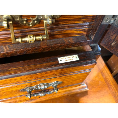 344 - Edwardian oak smokers cabinet with fitted interior and ivorine badge for Army & Navy Stores, and con... 