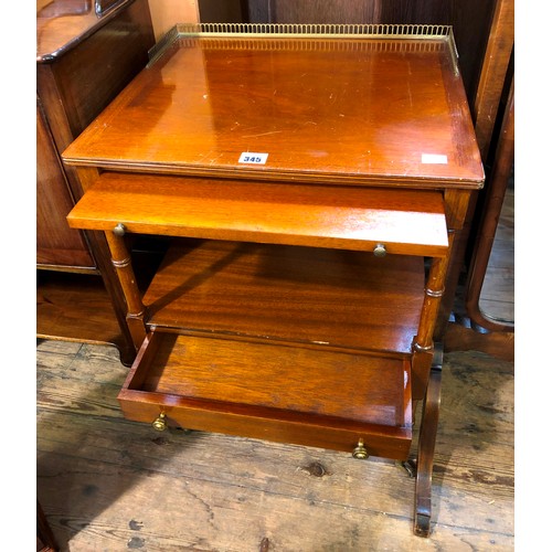 345 - Reproduction mahogany rectangular two tier occasional table with pierced brass gallery, slide and dr... 