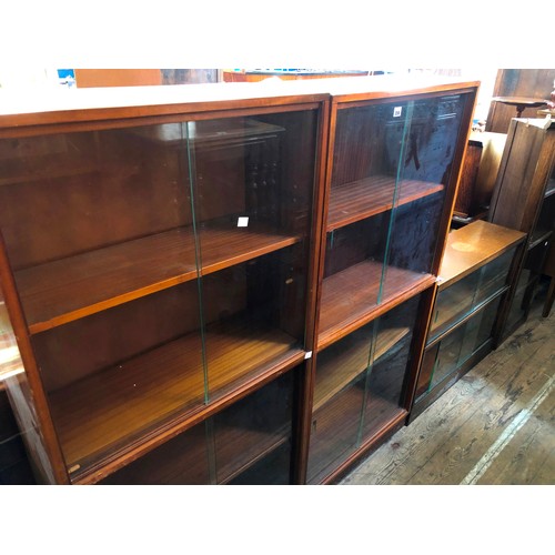 358 - Pair of 1970s mahogany glazed office bookcases with suppliers label for Todds of Lincoln, plus anoth... 