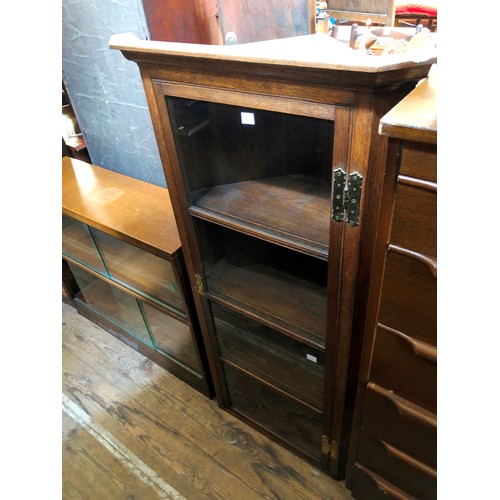 359 - Mid century oak wall mounted glazed corner cabinet with shelved interior