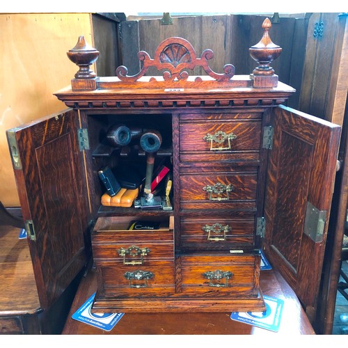 344 - Edwardian oak smokers cabinet with fitted interior and ivorine badge for Army & Navy Stores, and con... 