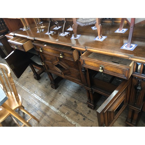 376 - Mid century Waring & Gillow oak sideboard with three frieze drawers over cupboards with fitted inter... 