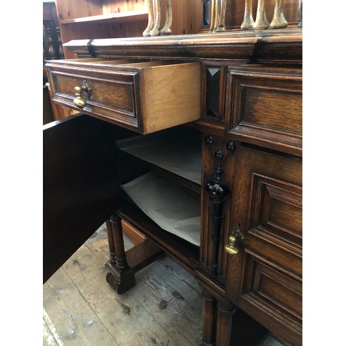 376 - Mid century Waring & Gillow oak sideboard with three frieze drawers over cupboards with fitted inter... 