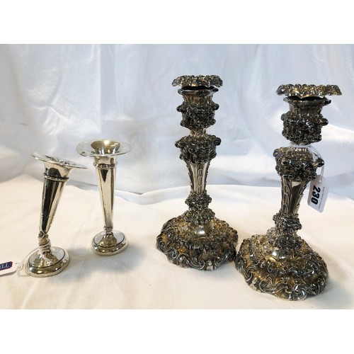 230 - A pair of London 1811 silver candlesticks, with profuse embossed foliate decoration and a pair of Bi... 