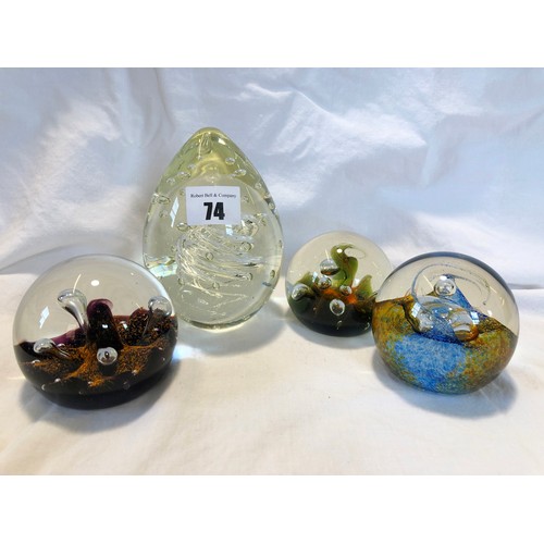 74 - Four various glass dump paperweights incl. 2 Caithness