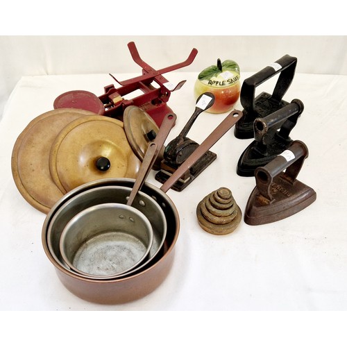 94 - Various vintage kitchenalia incl. three flat irons, graduated copper pans, scales etc