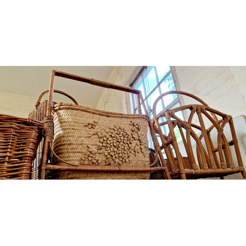 113 - Four various wicker baskets, hamper and two cane magazine racks