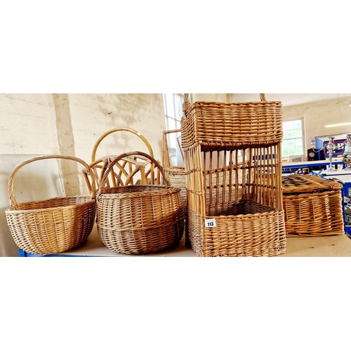 113 - Four various wicker baskets, hamper and two cane magazine racks