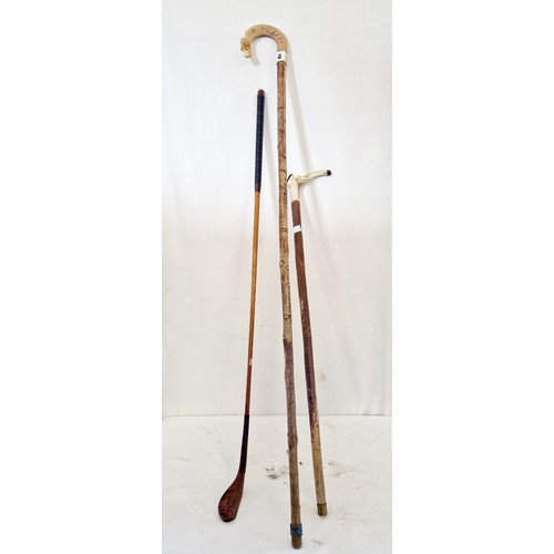 118 - Hickory shafted golf club and two bond handled walking sticks