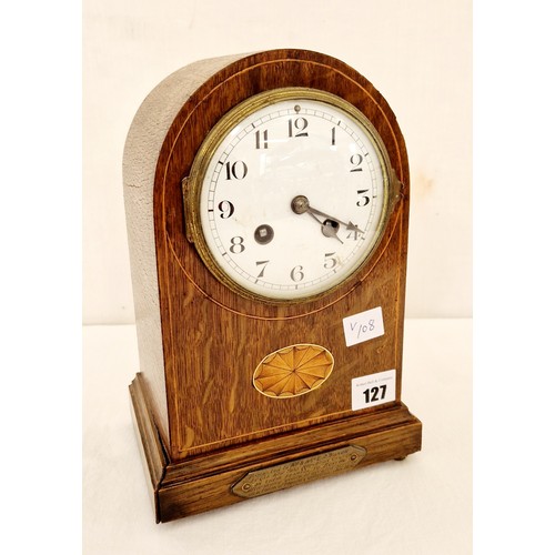 127 - Oak domed mantle clock with inlay and brass presentation plaque