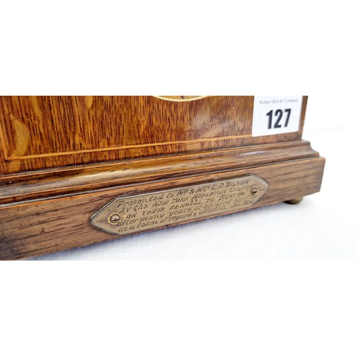 127 - Oak domed mantle clock with inlay and brass presentation plaque