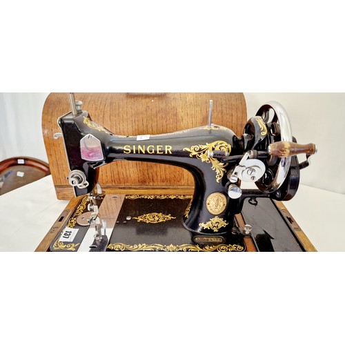 137 - Singer cased vintage sewing machine