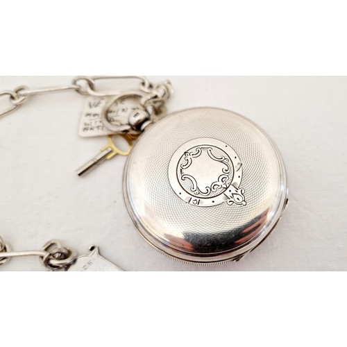 204 - A gents Chester 1899 silver pocket watch on chain with Birmingham 1924 shield form 'Winners' pendant... 