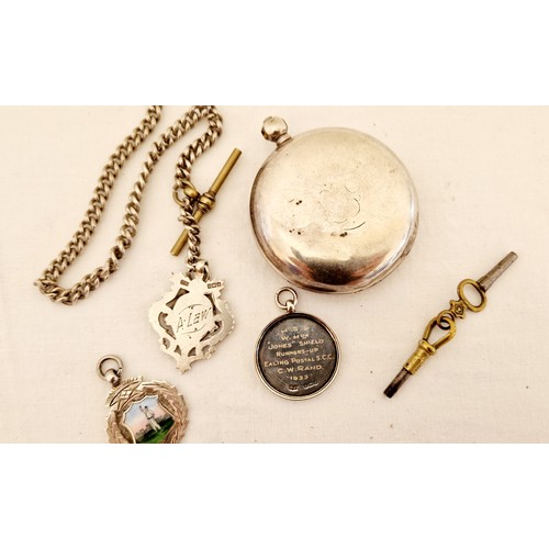 205 - Pocket watch in a Birmingham silver case, with fob chain and silver medallion inscribed A Law 1911 a... 