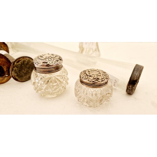 214 - Three moulded glass dressing table jars with ebonised silver lids and collar, glass specimen vase wi... 