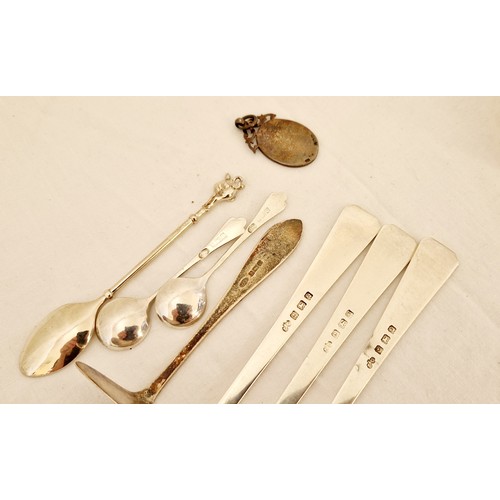 225 - Silver flatware comprising three Birmingham 1940 fish knives; a pair of Birmingham 1918 salt spoons;... 