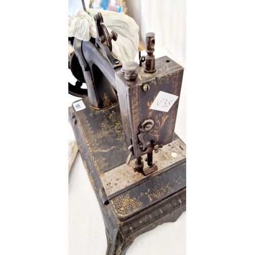 107 - Harris & Co Defiance Lock-Stitch sewing machine with instruction manual