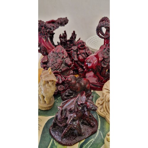 81 - Qty of figurines, predominantly resin Buddha figures, Goebel's etc