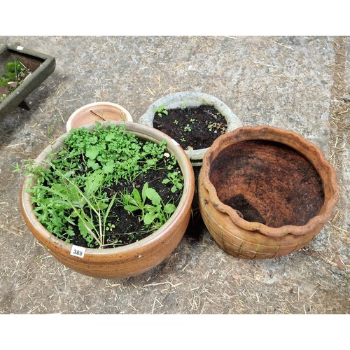 380 - 4 various terracotta and simulated stone planters