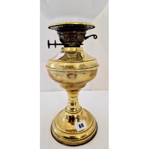 69 - Duplex brass oil lamp and circular pedestal base