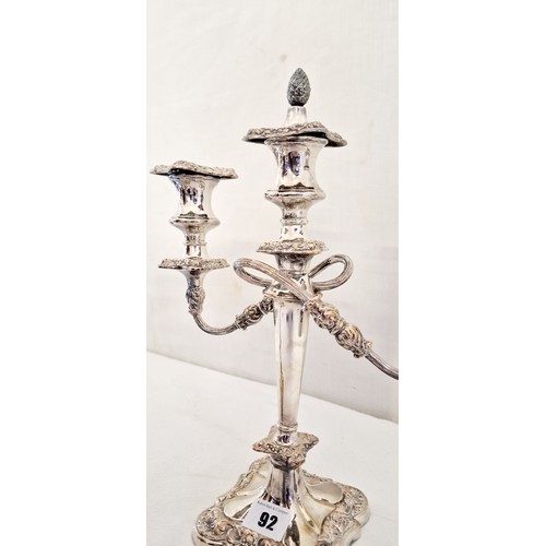 92 - A pair of ornate EPNS 3 branch candelabras