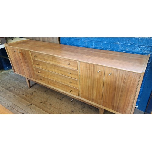 277 - Younger & Son vintage teak sideboard with central bank of four drawers incl. fitted cutlery, flanked... 