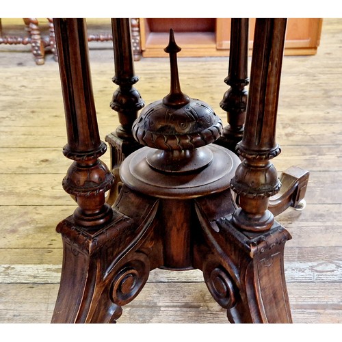 278 - Victorian walnut oval tilt-top tea table with boxwood inlay, four fluted supports to an ornate base ... 