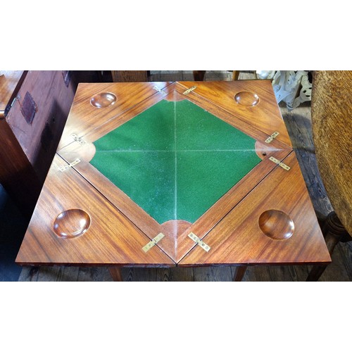 312 - A Victorian envelope card table with boxwood stringing and drawer on tapering square legs to castors