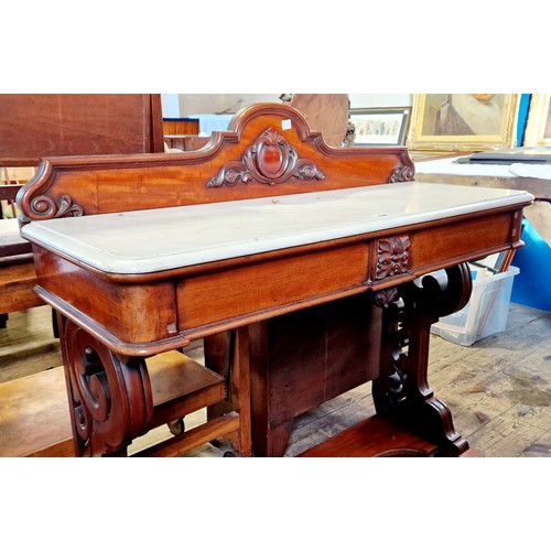 318 - A Victorian mahogany rectangular side table with marble top, 2 frieze drawers on shaped pierced supp... 