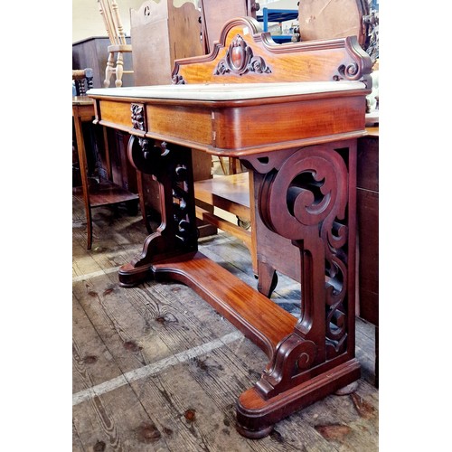 318 - A Victorian mahogany rectangular side table with marble top, 2 frieze drawers on shaped pierced supp... 