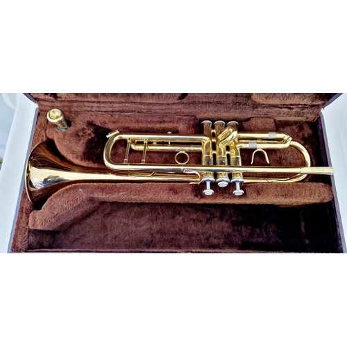 128 - Cased trumpet