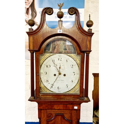 131 - Oak and mahogany long cased clock, the hood with swan neck pediment, enclosing an eight-day movement... 