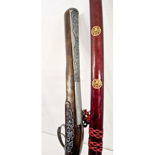 148 - An ornamental blunderbuss and Japanese officers modern ceremonial sword with stainless steel blade