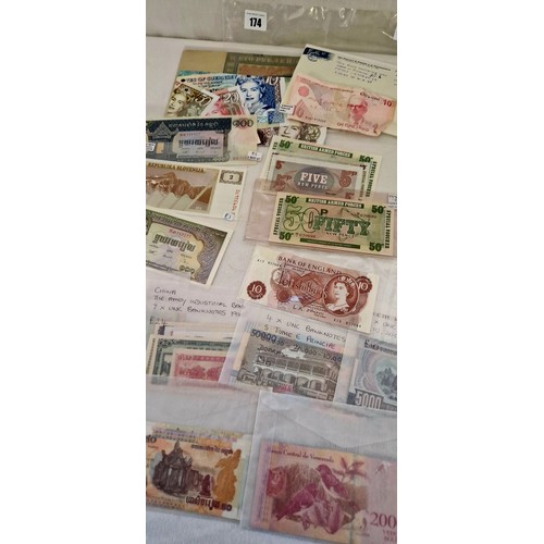 174 - A collection of bank notes, including GB Ten Shilling; GB Armed Forces Notes; various world notes In... 