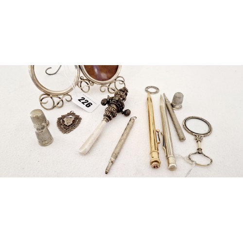 226 - Collection of various silver items, various dates and assay including three thimbles; baby mother of... 