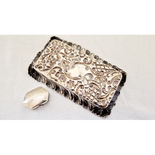 234 - Two pieces of silver ware, an ornate rectangular Birmingham 1899 pin tray with profuse embossed foli... 