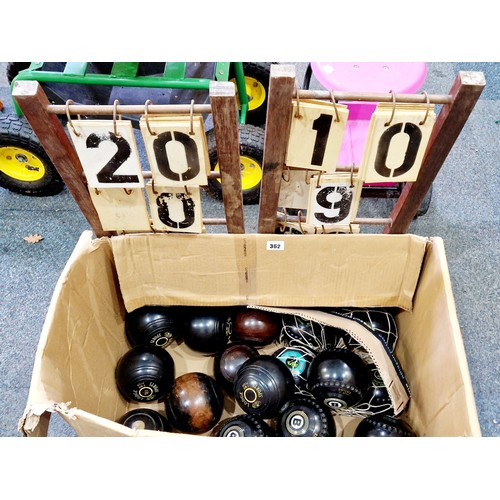 362 - A collection of approx. 15 vintage lawn bowls and 2 flip score boards