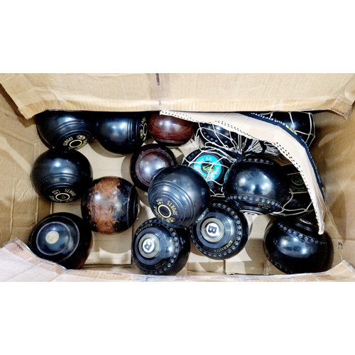 362 - A collection of approx. 15 vintage lawn bowls and 2 flip score boards