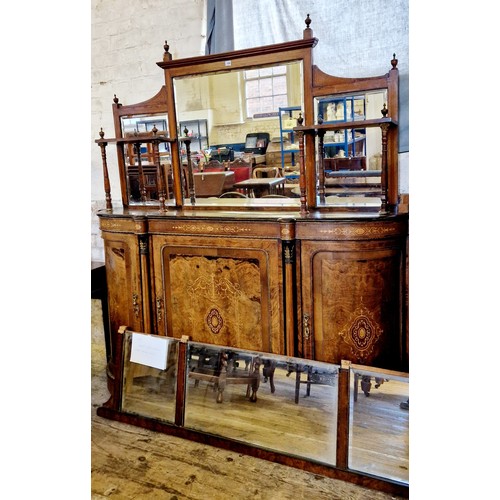 349 - A Victorian ornate side cabinet with mirrored back, finial supports, on a base of central cupboard f... 