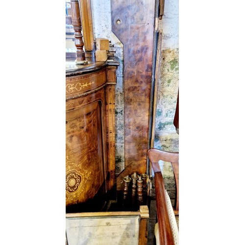 349 - A Victorian ornate side cabinet with mirrored back, finial supports, on a base of central cupboard f... 