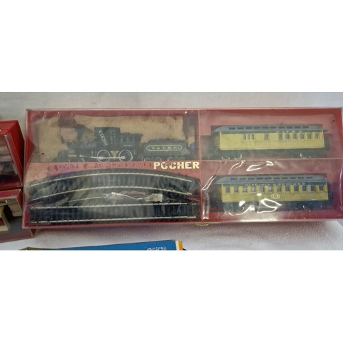 265 - Qty of boxed Pocher model railway, various carriages, engines etc