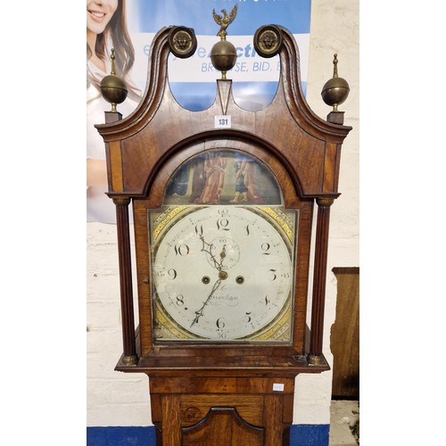 131 - Oak and mahogany long cased clock, the hood with swan neck pediment, enclosing an eight-day movement... 