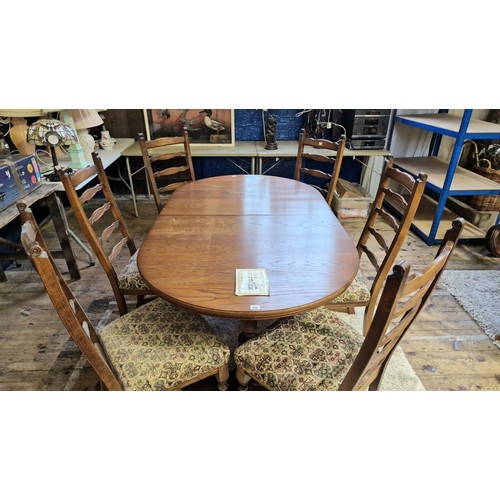 212 - Old Charm oak dining suite comprising D-ended extending table with 6 ladder back chairs with upholst... 