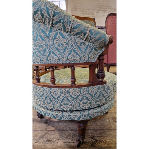 220 - Late Victorian mahogany framed upholstered swivel tub chair with turned supports and turned legs to ... 