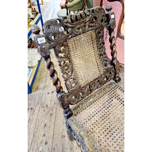 221 - Early 20th century oak ornately carved day bed with barley twist stretchers and rattan panels, some ... 